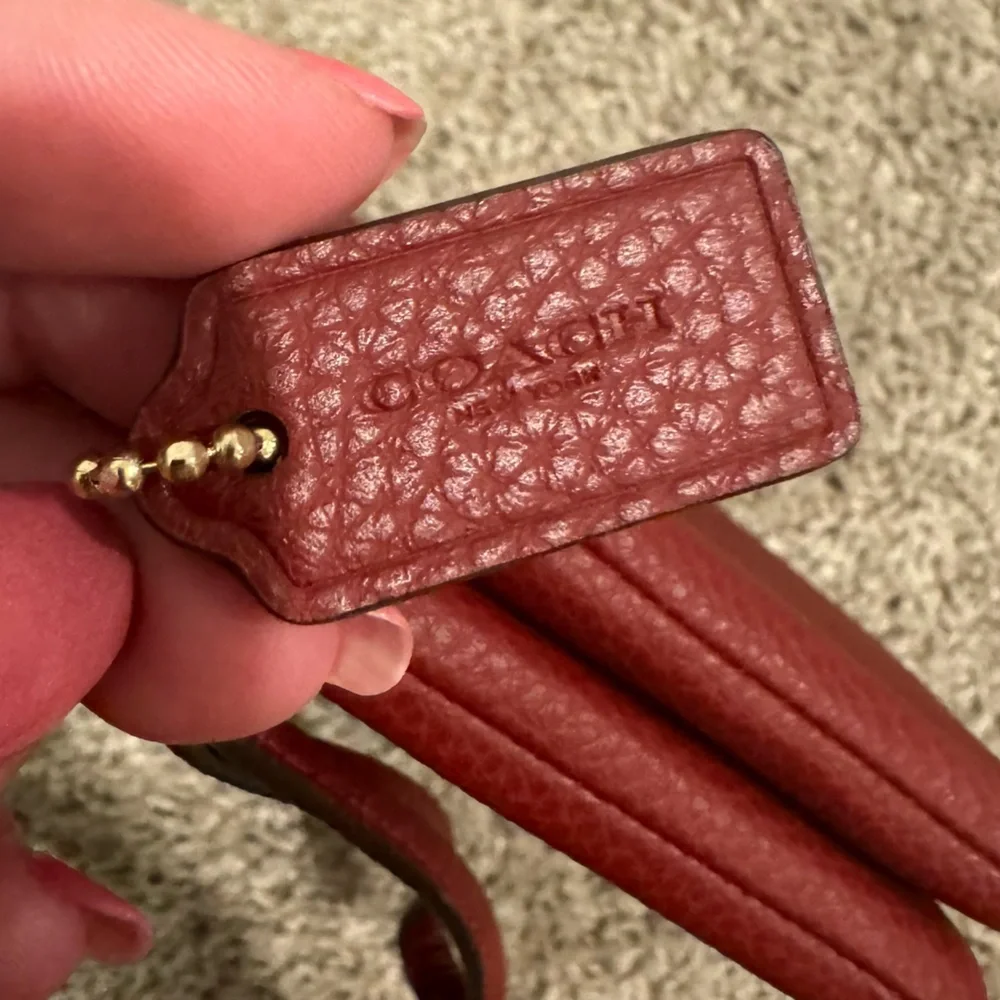Like 🆕 Coach saturated magenta mini wristlet wallet pouch